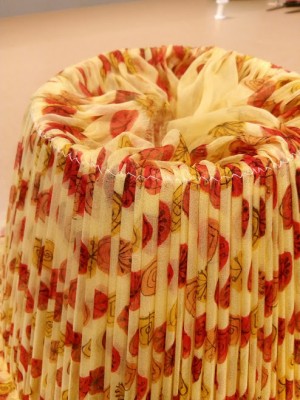 Making a gathered lampshade with contrast binding - the outer is stitched to the frame
