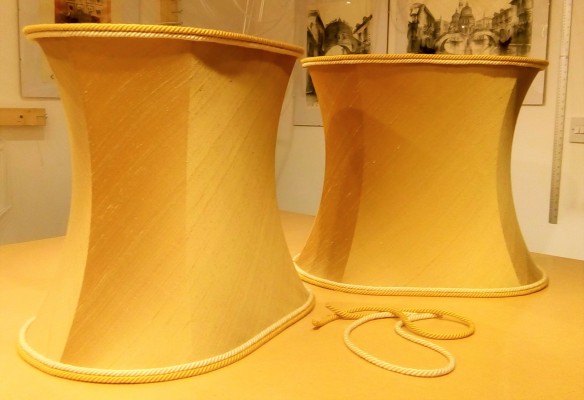 Bespoke oval lampshade frames with plain, hand-sewn cover and rope trim